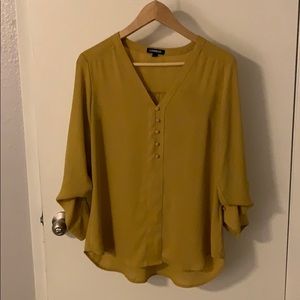 Express mustard blouse with rolled sleeves